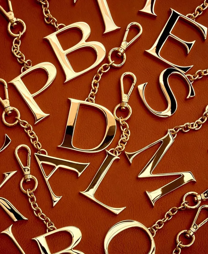 ManWoman Pendant Key Chain Gold Dooney and Bourke Key Keepers and Charms ManWoman Pendant Key Chain Gold Dooney and Bourke Key Keepers and Charms