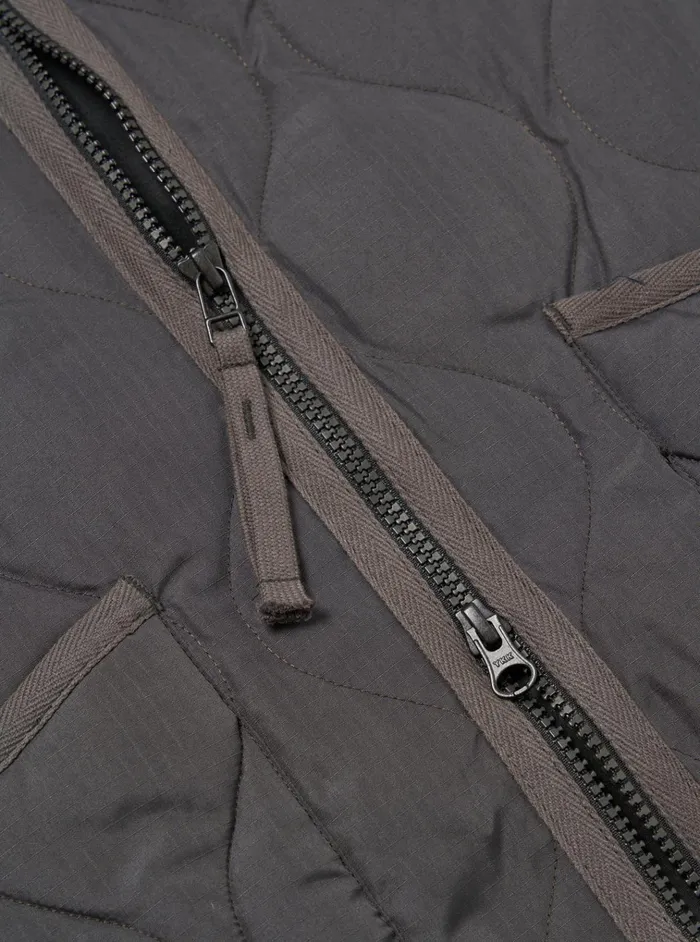 Waistcoats and Gilets Men Universal Works Taion Military VNeck Down Vest In Charcoal Ripstop
